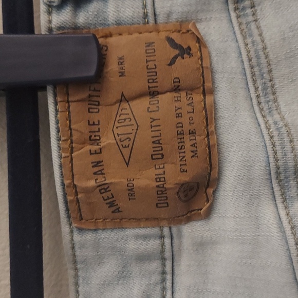 AMERICAN EAGLE OUTFITTERS Extreme Flex Light Blue Wash Distressed Skinny Jeans - Picture 8 of 14